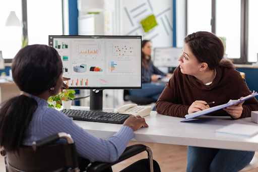 Digital marketing consultant reviewing campaign analytics and strategy during a marketing consultation session.